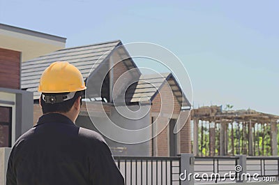 Construction Supervisor, Engineer Stand and watch the house under construction Single story house Seen building structure, masonry Editorial Stock Photo