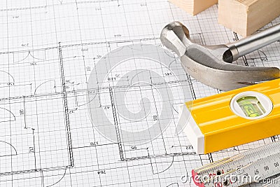 Construction tools and wooden strips on architectural blueprint house building plan with copy space Stock Photo