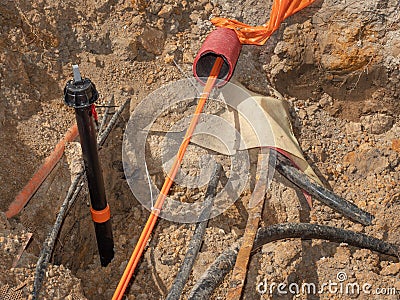 Construction trench with electrical wires. Road work Stock Photo