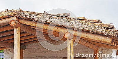 The construction of the wooden and cane roof Stock Photo