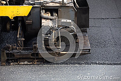 Construction work for road and highway repair,Concept: Transportation symbol for vehicle safety,Worker operating asphalt road Stock Photo