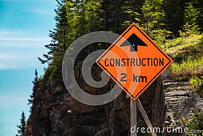 Construction work two kilometer ahead Stock Photo