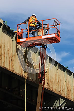 Construction Worker on Boom Lift Editorial Stock Photo