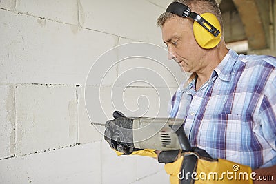 Construction worker with equipment Stock Photo