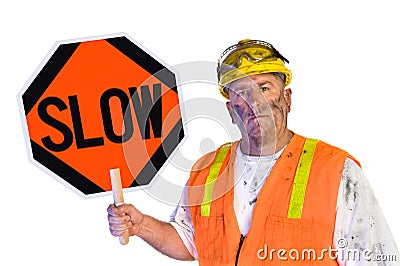 Construction worker holding a slow sign Stock Photo