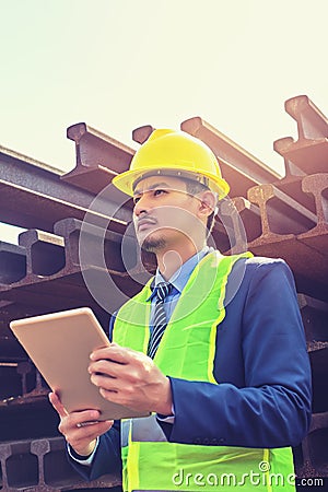 Construction Worker Planning Contractor Checking at site gas, oil, energy and factory construction Stock Photo