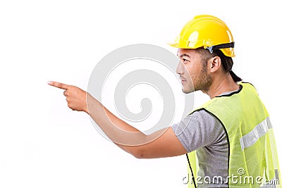 Construction worker pointing sideway Stock Photo