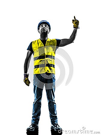 Construction worker signaling looking up hoist silhouette Stock Photo