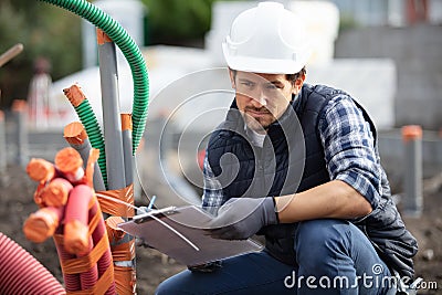 construction worker at construction site assembling foundation Stock Photo