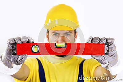 Construction worker with spirit level Stock Photo