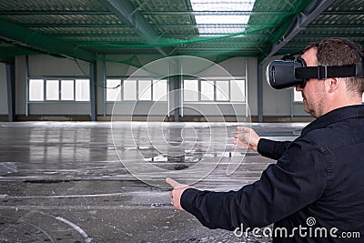 Construction worker wearing vr glasses Stock Photo