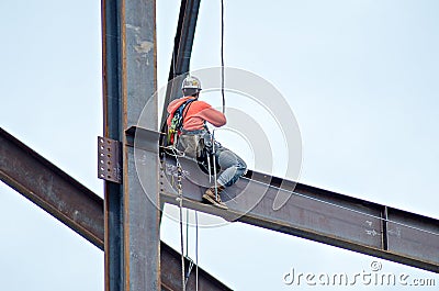 Construction worker working on highrise building Editorial Stock Photo