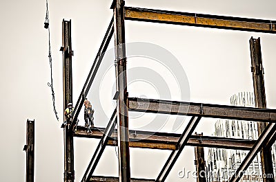 Construction worker working on highrise building Editorial Stock Photo