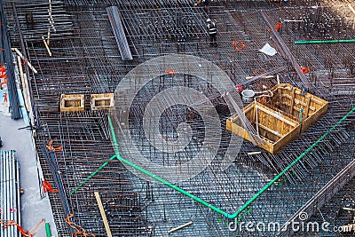 Construction workers fabricating steel reinforcement bar at the construction site Editorial Stock Photo