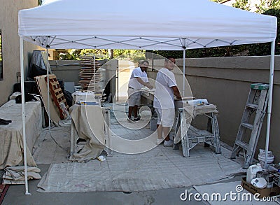 Construction Workers Painting at a Southern California Home Editorial Stock Photo