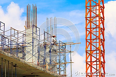Construction workers site and building of housing at laborer work outdoor with copy space add text High definition image Editorial Stock Photo