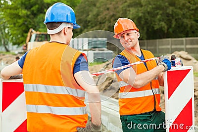Construction workers talking Stock Photo