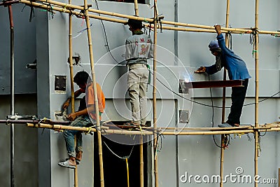 construction workers at work, digital photo picture as a background Editorial Stock Photo