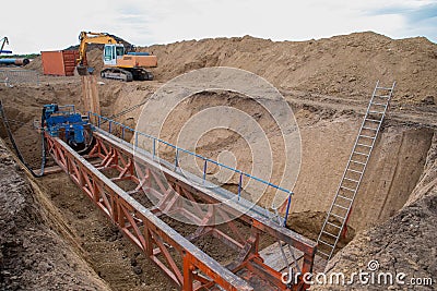 Laying the pipe of gas pipeline. Horizontal directional drilling Stock Photo