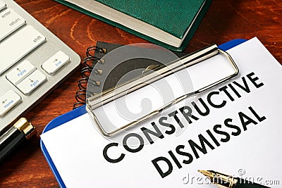 Constructive dismissal on a clipboard. Stock Photo