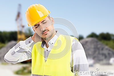 Constructor or builder suffering scruff pain Stock Photo