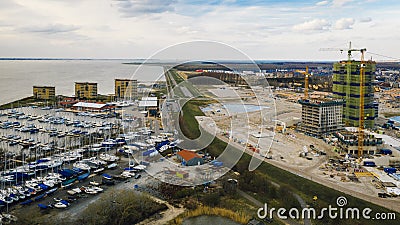 Constuction of a building a long a sailing boat harbour Editorial Stock Photo