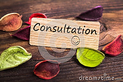 Consultation word in card Stock Photo