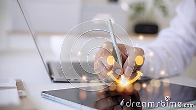 The consumer answered the survey in a conceptual way. Customer creates a happy face smiling symbol using a digital pen. The notion Stock Photo