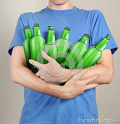 Consumer with a lot of bottles of beer Stock Photo