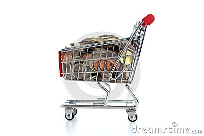 Consumerism concept with shopping trolley full of coins on white background Stock Photo