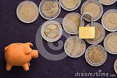 Consumption and economy. Economic recession, reduced consumption. Locked savings concept Stock Photo