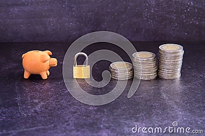 Consumption and economy. Economic recession, reduced consumption. Locked savings concept Stock Photo