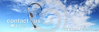 Contact concept , headset on blue sky, and contact us text Stock Photo