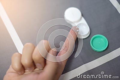 Contact eye lens or Soft eye lens on the finger. Stock Photo