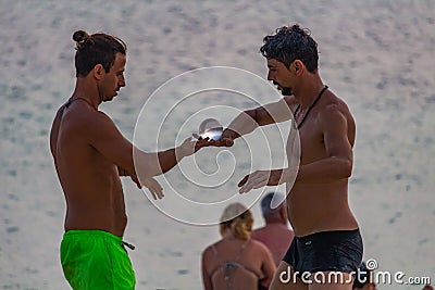 Contact juggling ball Zen Beach sunset Thailand Editorial Stock Photo