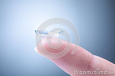 Contact Lens on a Finger Stock Photo