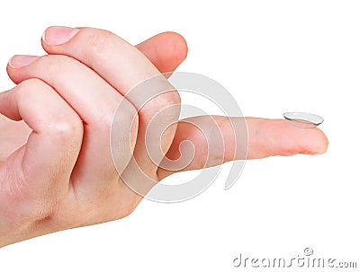 Contact lens on the index finger of female hand Stock Photo