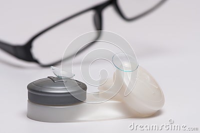 Contact lenses on case and optical glasses Stock Photo