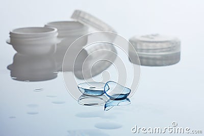 Contact lenses and case on white background. Eye health and care, eyesight and vision, ophthalmology and optometry Stock Photo