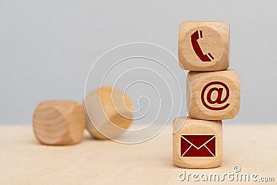 Contact options for support printed on cube Stock Photo