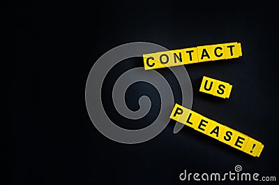 Contact Us Please word on the black background with free place for your text Stock Photo