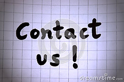 Contact us text hand written on paper Stock Photo