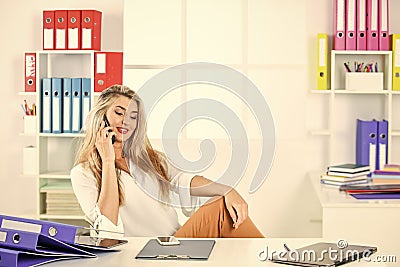 Contact us and think done. modern office life. businesswoman has paper work. confident manager working with documents Stock Photo