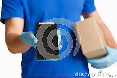 Contactless payment. Courier holds terminal with empty space Stock Photo