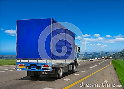 Container on the big highway. Stock Photo