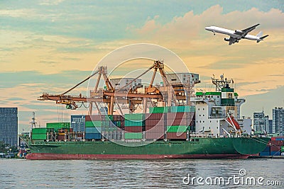 Container Cargo freight ship with working crane loading bridge i Stock Photo