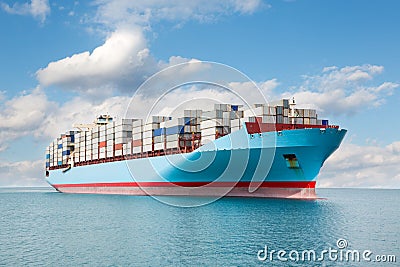 Container carrier is at sea Stock Photo