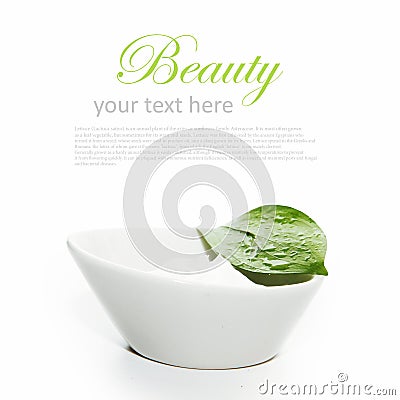 Container cream with green leaf isolated on white Stock Photo