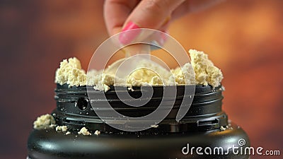 Container of nutritional supplement whey protein powder. Stock Photo