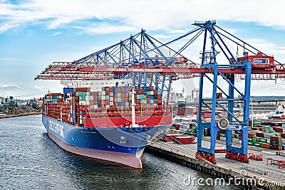Container ship COSCO SHIPPING GEMINI in the Port of Hamburg Editorial Stock Photo